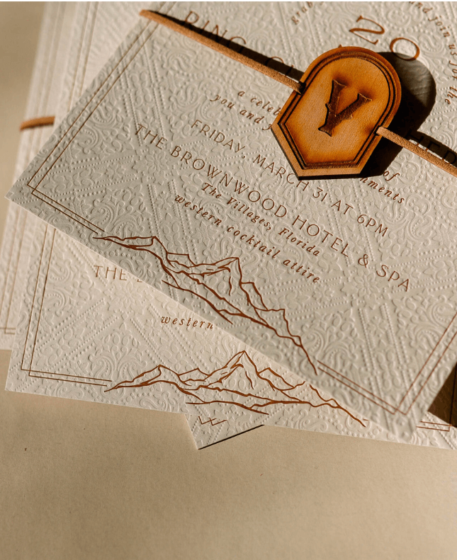 Blind deboss pattern on a wedding invitation